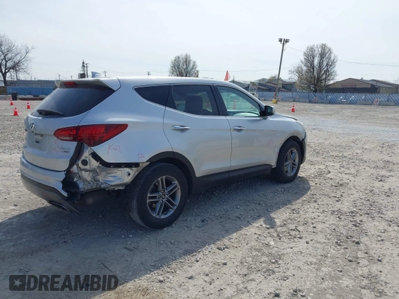 2017 Hyundai Santa Fe 2.4L z VIN 5XYZTDLB8HG465425, wystawiony jako IAAI lot #42041881 z przebiegiem 103 161 mil mil oraz . Historia ofert i sprzedaży dostępna na DreamBid. Obrazek 4.