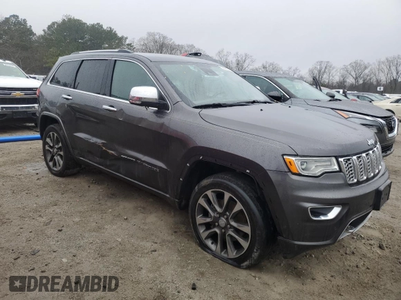 2018 Jeep Grand Cherokee High Altitude with VIN 1C4RJECG9JC221896, listed as a Copart auction lot 43239165 with 101,603 mi miles and Clean title. Bid and sale history available at DreamBid. Image 4.