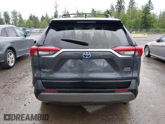 2021 Toyota RAV4 Hybrid XSE with VIN 2T3E6RFV4MW004081, listed as a IAAI auction lot 42300195 with 63,238 mi miles and . Bid and sale history available at DreamBid. Image 16.