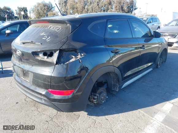 2017 Hyundai Tucson SE Plus with VIN KM8J33A46HU598450, listed as a IAAI auction lot 41709481 with 34,781 mi miles. Bid and sale history available at carsss.com. Image 4.