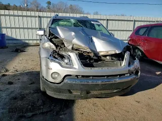 2007 GMC Acadia SLT z VIN 1GKER337X7J104400, wystawiony jako Copart lot #46266275 z przebiegiem 188 362 mil mil oraz Szkoda całkowita • Salvage title. Historia ofert i sprzedaży dostępna na DreamBid. Obrazek 11.