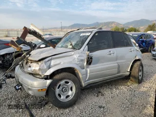2004 Suzuki Grand Vitara LX z VIN JS3TD62V744104983, wystawiony jako Copart lot #65290274 z przebiegiem Nie podano mil oraz Szkoda całkowita • Salvage title. Historia ofert i sprzedaży dostępna na DreamBid. Obrazek 1.