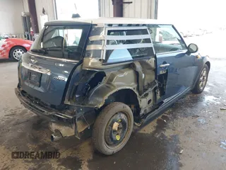 2009 MINI Hardtop with VIN WMWMF33599TU73901, listed as a IAAI auction lot 42149005 with 73,716 mi miles and . Bid and sale history available at DreamBid. Image 4.