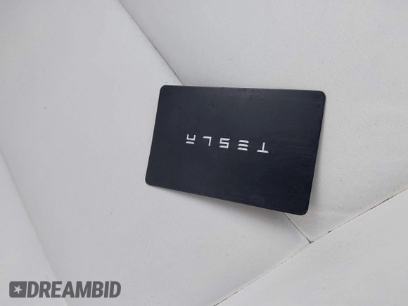 2018 Tesla Model 3 Long Range Battery with VIN 5YJ3E1EB9JF097118, listed as a IAAI auction lot 41619510 with 64,132 mi miles and . Bid and sale history available at DreamBid. Image 11.