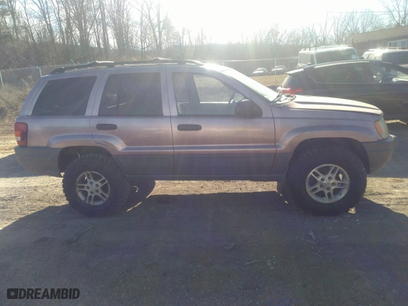 2002 Jeep Grand Cherokee Laredo with VIN 1J4GW48S92C169827, listed as a IAAI auction lot 41621901 with 169,373 mi miles. Bid and sale history available at carsss.com. Image 13.