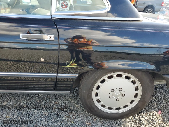 1989 Mercedes-Benz 560 Series 560SL with VIN WDBBA48D8KA101576, listed as a Copart auction lot 75503004 with 68,911 mi miles and Salvage Title. Bid and sale history available at carsss.com. Image 12.