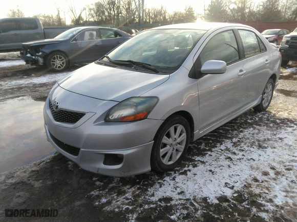 2010 Toyota Yaris with VIN JTDBT4K3XA1360452, listed as a IAAI auction lot 41557092 with 107,989 mi miles. Bid and sale history available at carsss.com. Image 2.