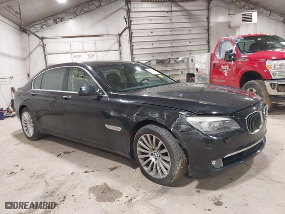 2012 BMW 7 Series 750Li xDrive with VIN WBAKC8C57CC435569, listed as a IAAI auction lot 41813222 with 139,751 mi miles. Bid and sale history available at carsss.com. Image 1.