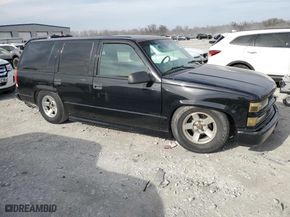 2000 Chevrolet Tahoe Limited with VIN 1GNEC13R8YR160994, listed as a Copart auction lot 49612635 with 207,062 mi miles and Salvage Title. Bid and sale history available at carsss.com. Image 4.