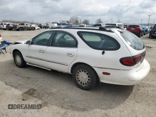 1999 Mercury Sable z VIN 1MEFM58U7XA652331, wystawiony jako Copart lot #49919194 z przebiegiem 143 835 mil mil oraz Szkody całkowita. Historia ofert i sprzedaży dostępna na DreamBid. Obrazek 2.
