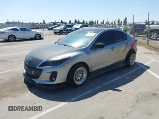2013 Mazda 3 i SV with VIN JM1BL1TG9D1765030, listed as a IAAI auction lot 42110584 with 143,723 mi miles. Bid and sale history available at carsss.com. Image 2.