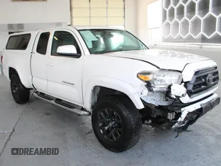 2021 Toyota Tacoma SR z VIN 3TYSZ5AN0MT009231, wystawiony jako Copart lot #59748295 z przebiegiem 37 912 mil mil oraz Szkoda całkowita • Salvage title. Historia ofert i sprzedaży dostępna na DreamBid. Obrazek 1.