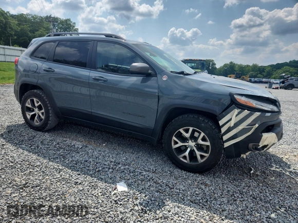 2014 Jeep Cherokee Trailhawk с VIN 1C4PJMBS1EW212024, выставлен на аукционе Copart как лот 58825265 с пробегом 99 087 миль миль и Списание • Salvage title. История ставок и продаж доступна на DreamBid. Изображение 4.