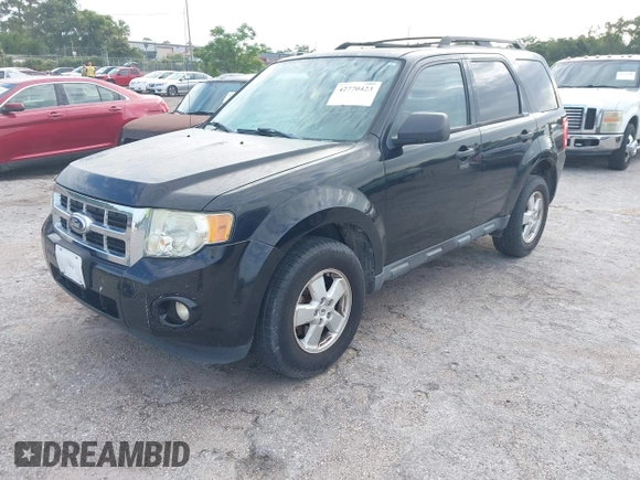 2012 Ford Escape XLT z VIN 1FMCU0DG6CKA42959, wystawiony jako IAAI lot #42770423 z przebiegiem 162 971 mil mil oraz . Historia ofert i sprzedaży dostępna na DreamBid. Obrazek 2.