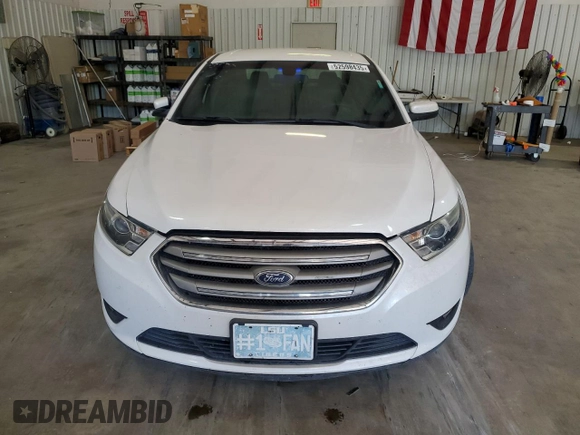 2017 Ford Taurus SEL z VIN 1FAHP2E87HG120587, wystawiony jako Copart lot #52598435 z przebiegiem 88 270 mil mil oraz Szkoda całkowita • Salvage title. Historia ofert i sprzedaży dostępna na DreamBid. Obrazek 5.