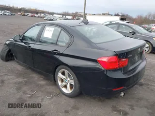 2014 BMW 3 Series 320i xDrive with VIN WBA3C3G59ENS70388, listed as a IAAI auction lot 41962815 with 195,393 mi miles. Bid and sale history available at carsss.com. Image 3.