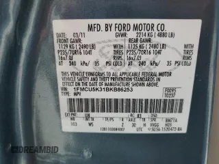 2011 Ford Escape Hybrid with VIN 1FMCU5K31BKB86253, listed as a Copart auction lot 57509525 with 159,486 mi miles and Salvage title. Bid and sale history available at DreamBid. Image 13.