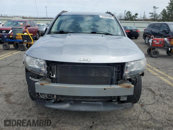 2014 Jeep Compass Latitude with VIN 1C4NJDEB4ED788348, listed as a Copart auction lot 52885935 with 86,282 mi miles and Salvage Title. Bid and sale history available at DreamBid. Image 5.
