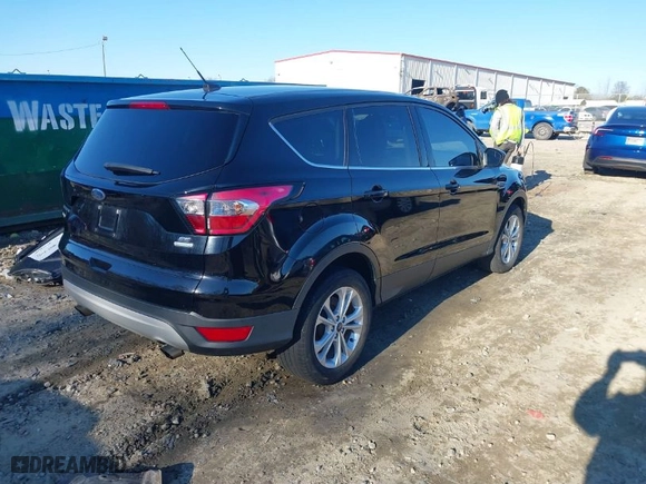 2017 Ford Escape SE with VIN 1FMCU0GD7HUC59045, listed as a IAAI auction lot 41304143 with 125,809 mi miles. Bid and sale history available at carsss.com. Image 4.
