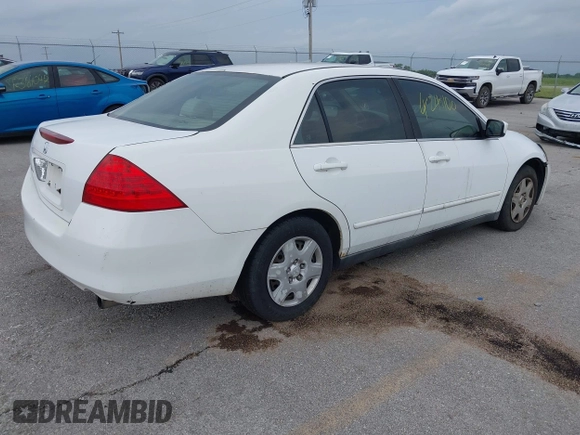 2007 Honda Accord LX with VIN 1HGCM56457A052786, listed as a IAAI auction lot 42421100 with 228,657 mi miles and . Bid and sale history available at DreamBid. Image 4.