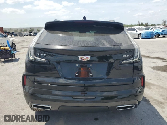2024 Cadillac XT4 FWD Sport with VIN 1GYFZER41RF136970, listed as a Copart auction lot 53550865 with 13,143 mi miles and Non repairable. Bid and sale history available at DreamBid. Image 6.