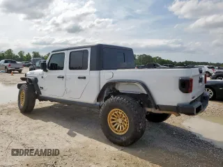 2022 Jeep Gladiator Willys Sport z VIN 1C6HJTAG3NL108428, wystawiony jako Copart lot #59379285 z przebiegiem 55 054 mil mil oraz Szkoda całkowita • Salvage title. Historia ofert i sprzedaży dostępna na DreamBid. Obrazek 2.