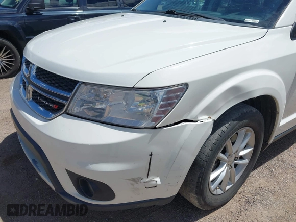 2017 Dodge Journey SXT z VIN 3C4PDDBG7HT512776, wystawiony jako IAAI lot #41967109 z przebiegiem 109 747 mil mil oraz . Historia ofert i sprzedaży dostępna na DreamBid. Obrazek 6.