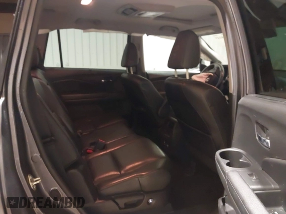 2017 Honda Pilot Touring with VIN 5FNYF6H91HB084737, listed as a IAAI auction lot 41608145 with 86,696 mi miles. Bid and sale history available at carsss.com. Image 8.