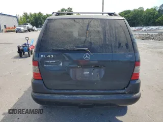 1999 Mercedes-Benz M-Class with VIN 4JGAB72E7XA107952, listed as a Copart auction lot 58559244 with 175,236 mi miles and Non Repairable. Bid and sale history available at carsss.com. Image 6.