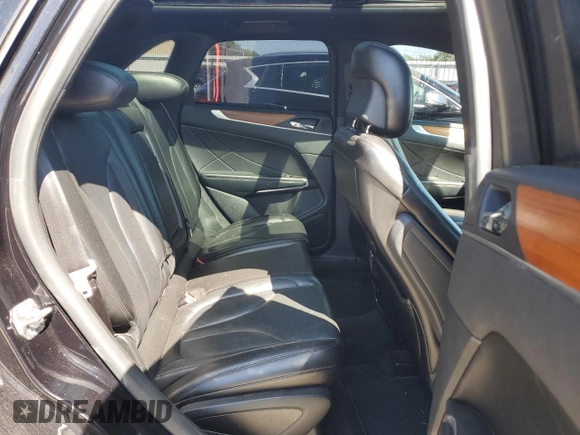 2019 Lincoln MKC Select z VIN 5LMCJ2D91KUL22696, wystawiony jako Copart lot #56699465 z przebiegiem 88 532 mil mil oraz Szkoda całkowita • Salvage title. Historia ofert i sprzedaży dostępna na DreamBid. Obrazek 11.