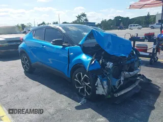 2019 Toyota C-HR XLE with VIN NMTKHMBX6KR097934, listed as a IAAI auction lot 39276687 with 56,973 mi miles. Bid and sale history available at carsss.com. Image 1.