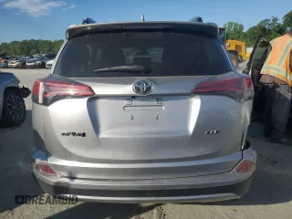 2018 Toyota RAV4 XLE with VIN JTMWFREV0JJ191707, listed as a Copart auction lot 57821575 with Not provided miles and Salvage title. Bid and sale history available at DreamBid. Image 6.
