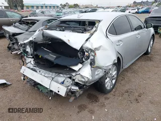 2013 Lexus ES 300h z VIN JTHBW1GG2D2009503, wystawiony jako IAAI lot #42429692 z przebiegiem 265 312 mil mil oraz . Historia ofert i sprzedaży dostępna na DreamBid. Obrazek 6.