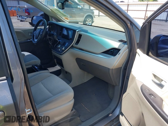 2015 Toyota Sienna LE AAS with VIN 5TDKK3DC4FS617903, listed as a IAAI auction lot 42390155 with 151,975 mi miles and . Bid and sale history available at DreamBid. Image 5.