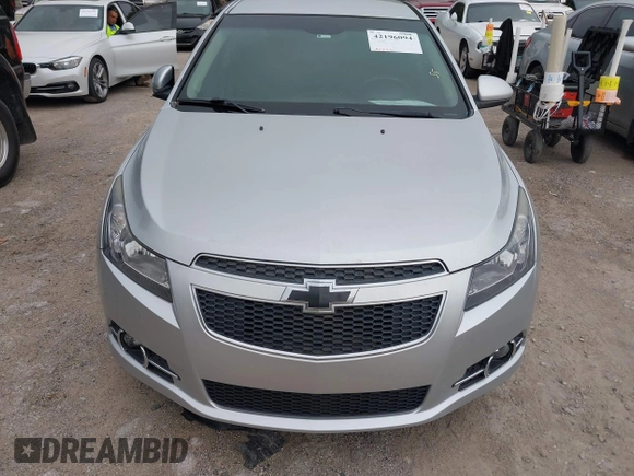 2014 Chevrolet Cruze 1LT with VIN 1G1PC5SB1E7229344, listed as a IAAI auction lot 42196094 with 97,226 mi miles and . Bid and sale history available at DreamBid. Image 6.