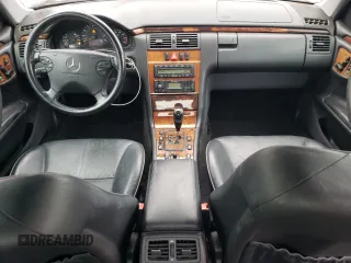 2002 Mercedes-Benz E-Class with VIN WDBJF65J42B486633, listed as a Copart auction lot 76979054 with 151,429 mi miles and Salvage Title. Bid and sale history available at carsss.com. Image 8.