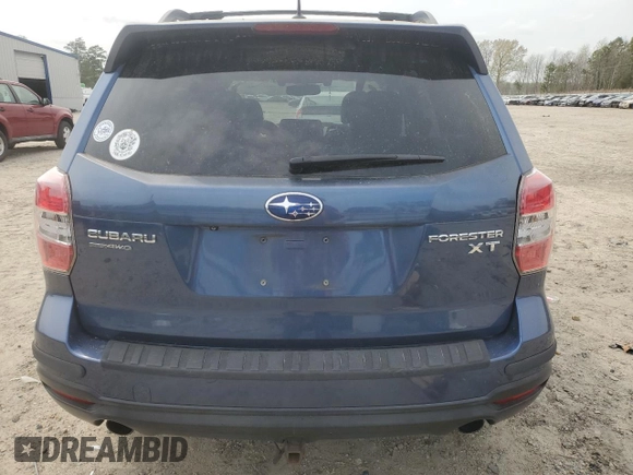2014 Subaru Forester XT Touring z VIN JF2SJGPC0EH413612, wystawiony jako Copart lot #51645345 z przebiegiem 158 805 mil mil oraz Czysty tytuł • Clean title. Historia ofert i sprzedaży dostępna na DreamBid. Obrazek 6.