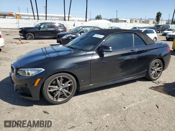 2015 BMW 2 Series M235i with VIN WBA1M1C56FV393730, listed as a Copart auction lot 45348734 with 59,231 mi miles and Salvage title. Bid and sale history available at DreamBid. Image 1.