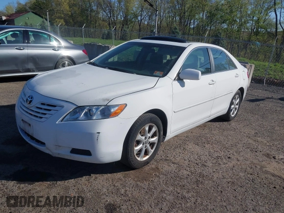 2009 Toyota Camry with VIN 4T1BE46K49U813806, listed as a IAAI auction lot 42141396 with 165,619 mi miles. Bid and sale history available at carsss.com. Image 2.