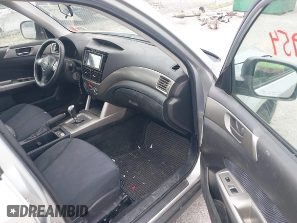 2010 Subaru Forester X with VIN JF2SH6BC0AH788214, listed as a IAAI auction lot 42572954 with 185,564 mi miles and . Bid and sale history available at DreamBid. Image 5.