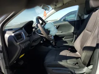 2023 Kia Rio LX with VIN 3KPA24AD3PE613044, listed as a Copart auction lot 46175935 with 49,379 mi miles and Salvage Title. Bid and sale history available at DreamBid. Image 7.