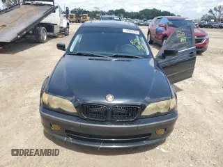 2002 BMW 3 Series 330i with VIN WBAEV53472KM01777, listed as a Copart auction lot 70984764 with 105,293 mi miles and Salvage Title. Bid and sale history available at carsss.com. Image 5.