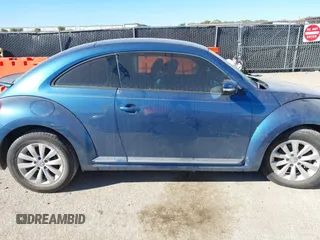 2019 Volkswagen Beetle S with VIN 3VWFD7AT7KM719095, listed as a IAAI auction lot 40919031 with 86,516 mi miles. Bid and sale history available at carsss.com. Image 14.