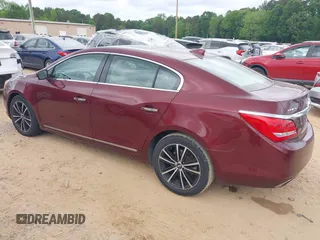2015 Buick LaCrosse Premium I with VIN 1G4GD5G36FF174740, listed as a IAAI auction lot 42133414 with 121,408 mi miles and . Bid and sale history available at DreamBid. Image 3.