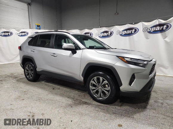 2022 Toyota RAV4 Hybrid XLE Premium with VIN 4T3B6RFV1NU080099, listed as a Copart auction lot 60206905 with 59,859 mi miles and Clean title. Bid and sale history available at DreamBid. Image 4.