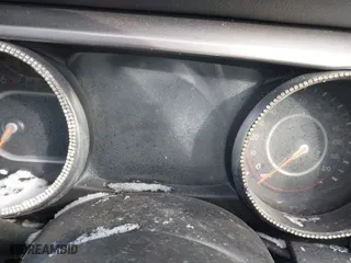 2019 Jeep Wrangler Unlimited Sahara Altitude with VIN 1C4HJXEG3KW580097, listed as a IAAI auction lot 41345888 with 56,592 mi miles. Bid and sale history available at carsss.com. Image 7.