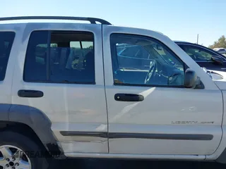 2002 Jeep Liberty Sport with VIN 1J8GL48KX2W153948, listed as a IAAI auction lot 41843882 with 180,677 mi miles. Bid and sale history available at carsss.com. Image 13.