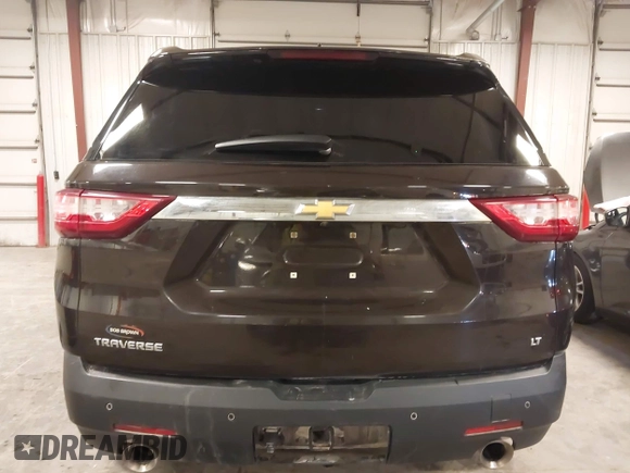 2019 Chevrolet Traverse LT Cloth z VIN 1GNERGKW1KJ158891, wystawiony jako IAAI lot #41996781 z przebiegiem 90 252 mil mil oraz . Historia ofert i sprzedaży dostępna na DreamBid. Obrazek 17.
