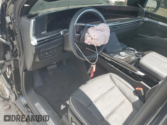 2025 Cadillac Escalade z VIN 1GYS9BRL7SR221143, wystawiony jako Copart lot #55594795 z przebiegiem 463 mil mil oraz Szkoda całkowita • Salvage title. Historia ofert i sprzedaży dostępna na DreamBid. Obrazek 8.