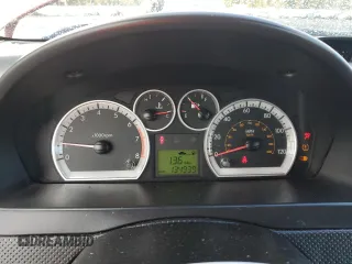 2009 Chevrolet Aveo 2LT z VIN KL1TG66E29B330570, wystawiony jako Copart lot #77913364 z przebiegiem 134 939 mil mil oraz Szkoda całkowita • Salvage title. Historia ofert i sprzedaży dostępna na DreamBid. Obrazek 9.